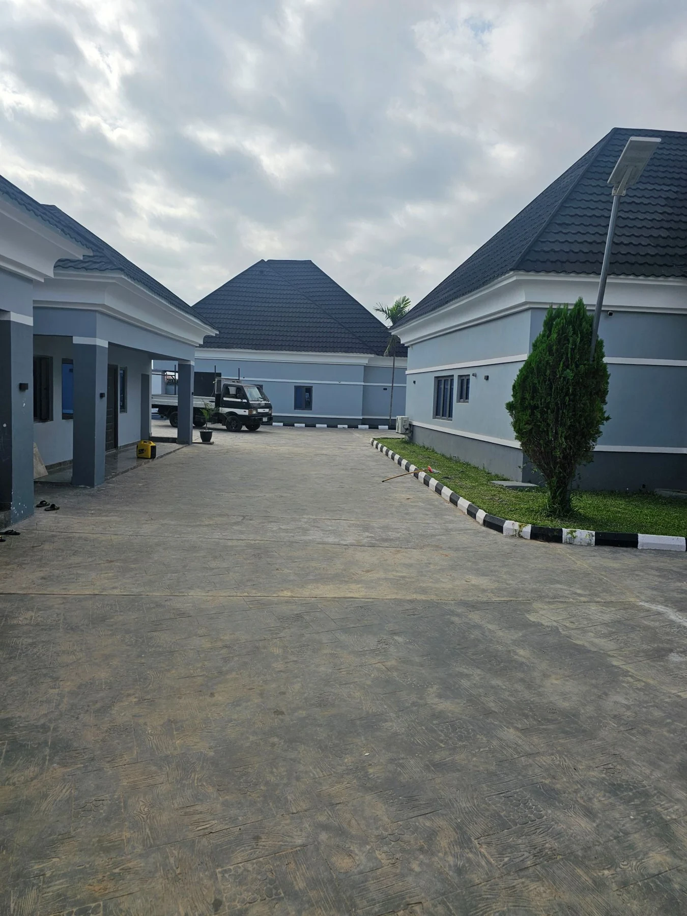 Gen. IB Residence updated exterior and courtyard